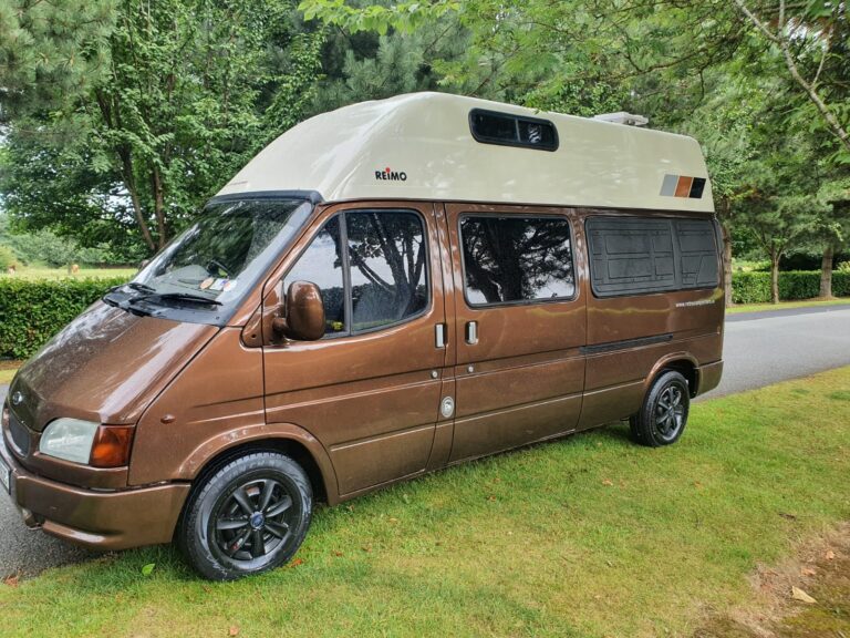 Roadie front and side exterior parked on grass