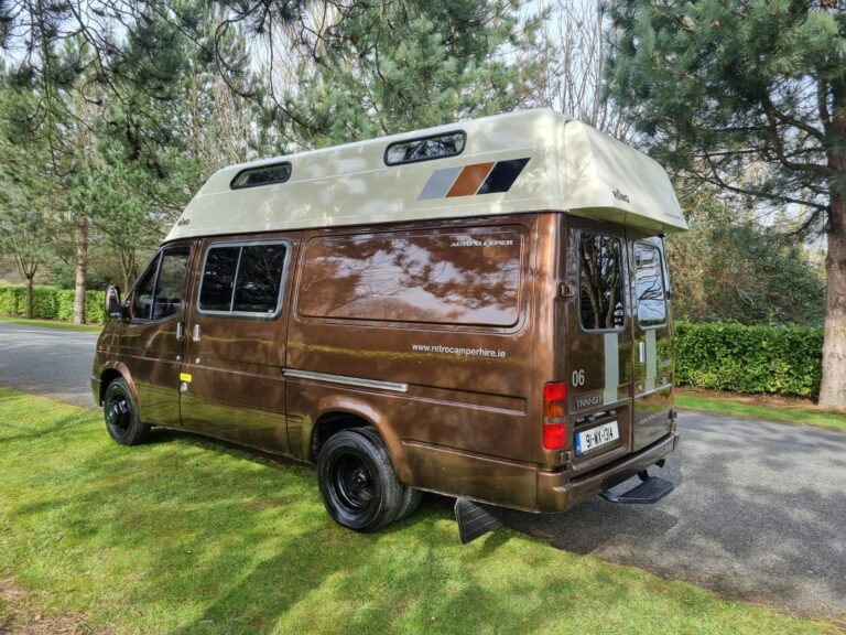 Warrior rear and side exterior beside trees