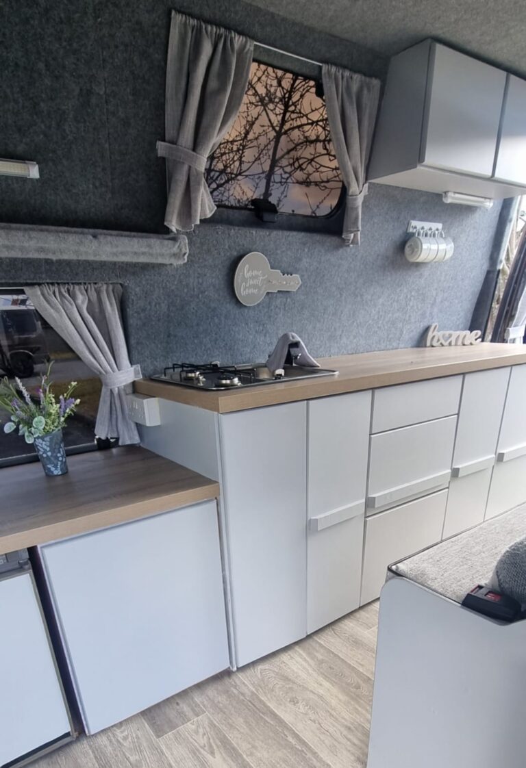 Betsy side kitchen with overhead cupboards