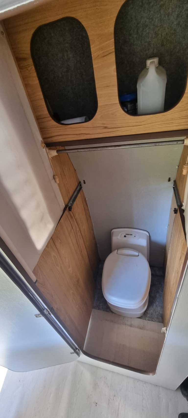 Bertha enclosed toilet compartment