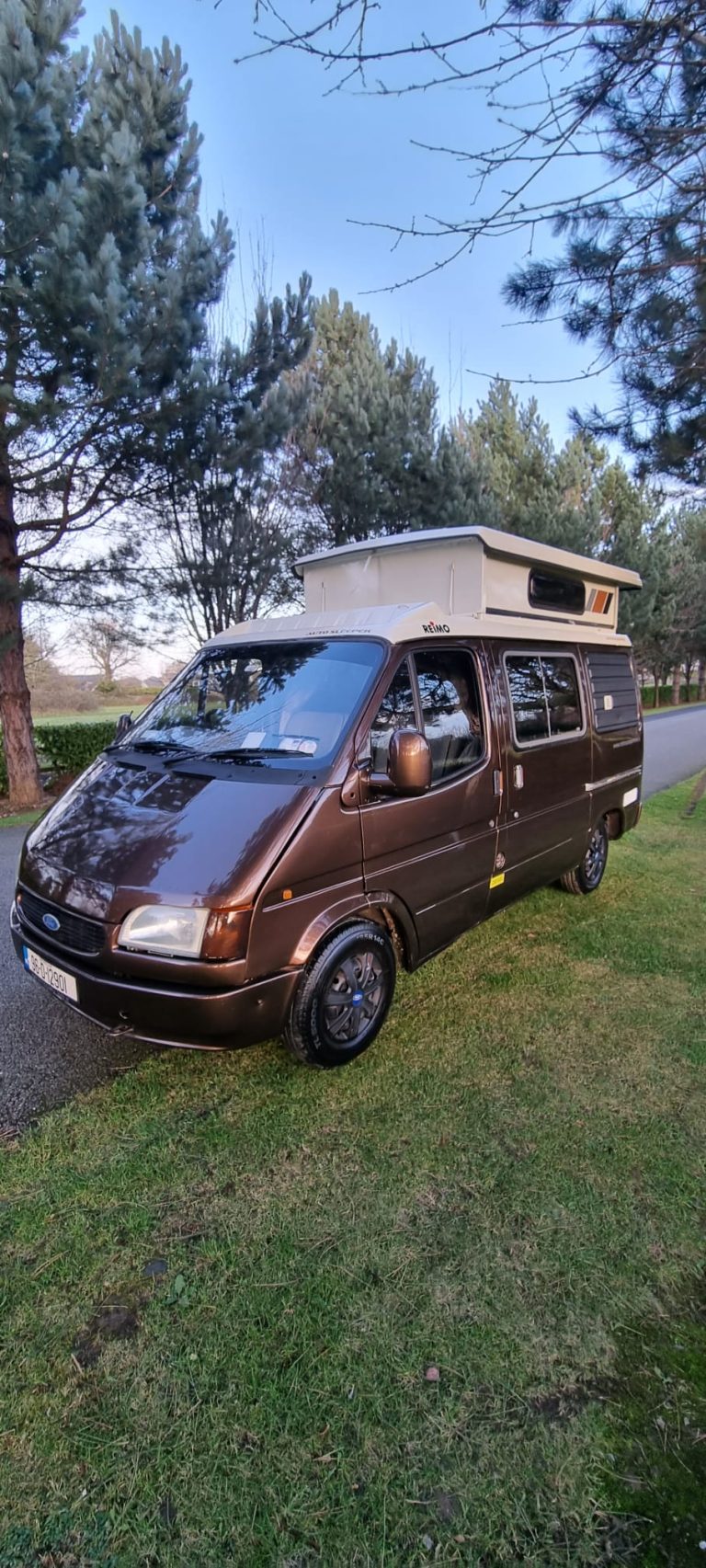 Layla front and side exterior with the roof raised