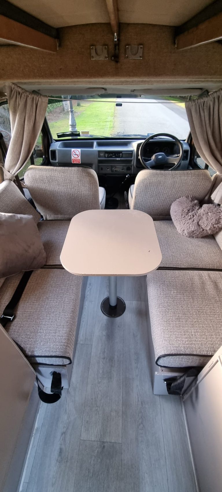 Layla facing bench seats with a dining table