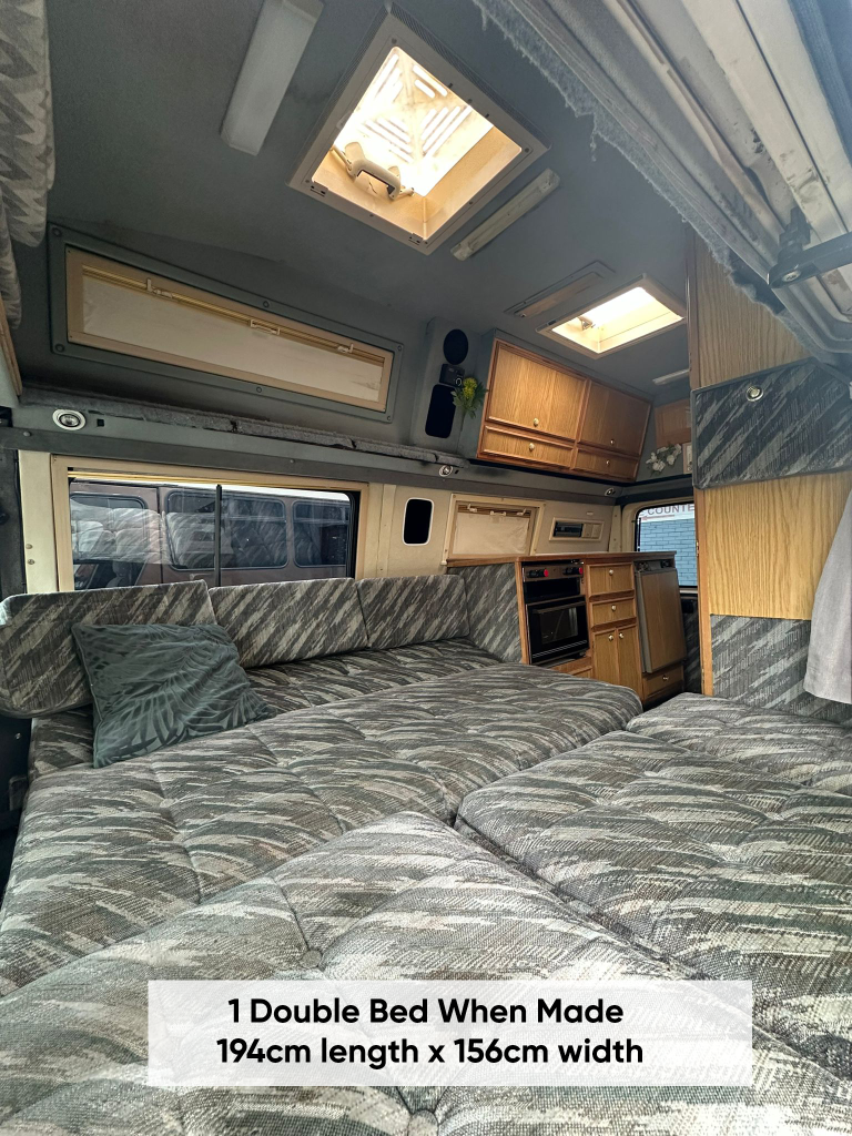 Shelby lower double bed made up, labelled 194 cm long by 156 cm wide