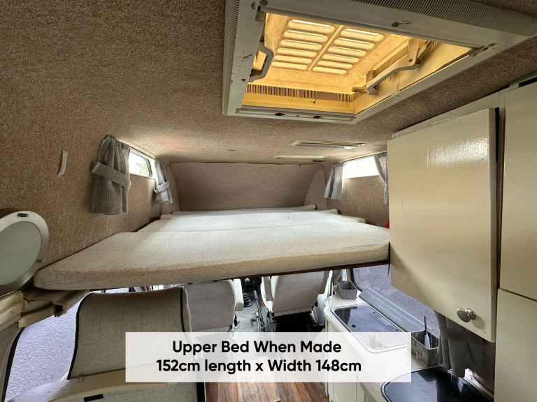 Warrior upper bed made up, labelled 152 cm long by 148 cm wide