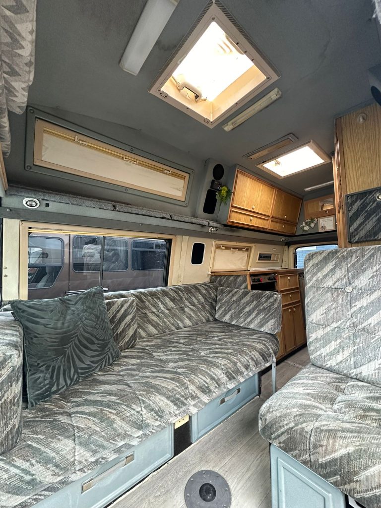 Shelby lounge with facing bench seats beneath the rooflight