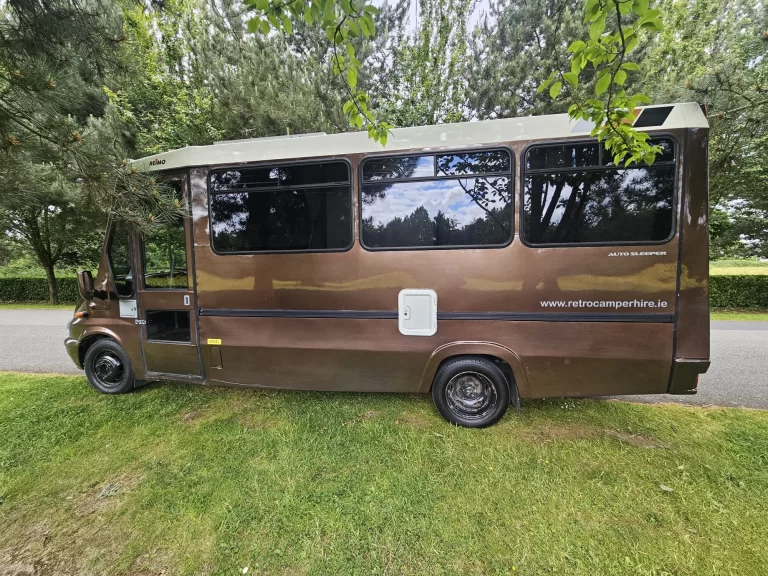 Grande campervan side view with the entrance open