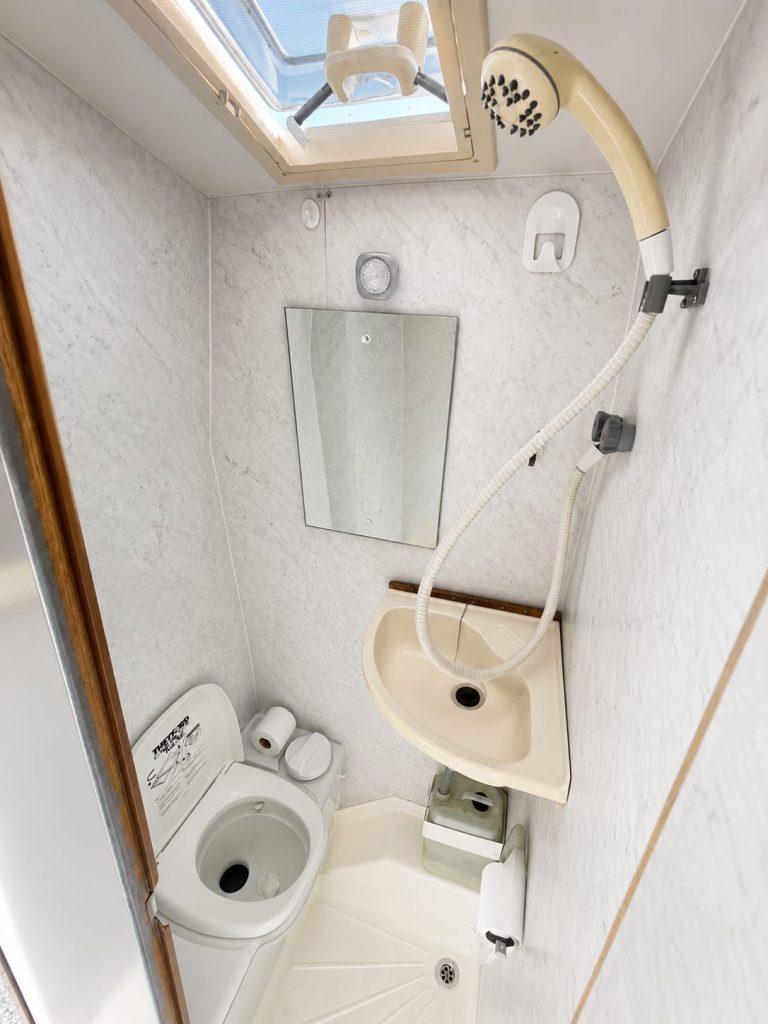 Maverick bathroom with a toilet and shower